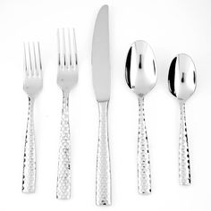 four forks, two knives and three spoons on a white surface