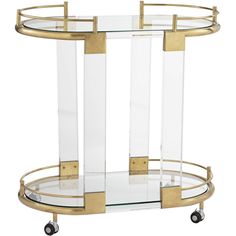 a round glass and brass bar cart with wheels on casteors, designed in the style of art deco