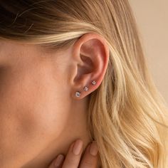 The perfect studs do exist- our Booker Diamond Studs are essential for your everyday collection. Choose the size that is the perfect amount of dainty for you, or stack all 3 sizes together for an elevated yet effortless look. With an ultra Light Weight Design, wear these all day, every day and forget they’re even on your ear. SKU: RR-ER201, RR-ER202, RR-ER203; BB-EB029 Product Details Material: High Quality Solid 925 Sterling Silver Finish: Sterling Silver ∙ 18K Gold Featured Styles Featured Sty Caitlyn Minimalist, Diamond Huggies, Art Deco Diamond Rings, Stud Style, Birthstone Gifts, Stud Set, Diamond Stud Earrings, Art Deco Diamond, Timeless Jewelry