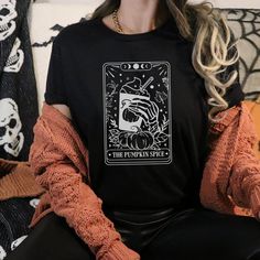 Get into the spooky spirit with our Pumpkin Spice Tarot Card Halloween T-Shirt! This stylish tee is the ideal choice for showcasing your adoration of pumpkin spice during the Halloween season. Tarot Card Halloween, Halloween T Shirt, Halloween Season, Tarot Card, Halloween Tshirts, Tarot Cards, Pumpkin Spice, Solid Black, Fashion Clothes Women