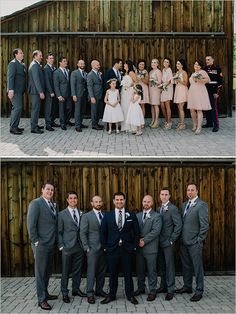 a group of people standing next to each other in front of a wooden fence and building