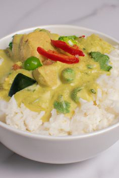 a white bowl filled with rice and vegetables