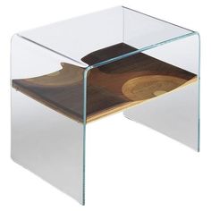 a wooden and glass side table with a piece of wood in the bottom section on top