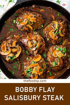 a skillet filled with meat covered in mushroom gravy and garnished with parsley