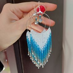 Hoop earrings with fringes made by hand, with Miyuki beads. The hook is made of 925 sterling silver. They have a very beautiful fall and movement thanks to the fringes. White, light blue, blue, silver and silver blue. Blue Bohemian Beaded Sterling Silver Earrings, Bohemian Blue Beaded Sterling Silver Earrings, Blue Fringe Earrings As Gift, Blue Fringe Earrings For Gift, Silver Jewelry With Fringe And Round Beads, Silver Fringe Beaded Earrings For Gift, Silver Beaded Fringe Earrings For Gift, Bohemian Blue Sterling Silver Hoop Earrings, Blue Bohemian Sterling Silver Hoop Earrings