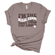 I'm the Nail Tech they told you about Tshirt How to Order: Choose Heather Color ,Solid Color Tshirt  Add Shirt/Font color in personalization Ex: white shirt, Font: black and nail tech with heart: pink Nail Tech Shirt Ideas, Nail Tech Shirts, Solid Color Tshirt, Ad Ideas, Artist Shirts, Tech Shirt, Cricut Projects Vinyl, Work Shirt, Told You