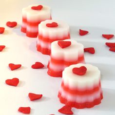 small red and white desserts with hearts on them