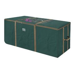 a large green storage bag with flowers on the top and side panels in gold trimmings