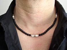 This simple yet masculine necklace is carefully handmade by me, featuring 6mm Black Onyx semi precious stone beads and 6mm White Howlite round bead. Lead safe antique silver engraved metal spacers beads, cube metal beads and antique silver detailed tube beads are added to both ends of the necklace. Professional metal wire is used for durability. It finishes off with antique silver detailed toggle clasp. Lobster clasp is also available if you prefer. Great gift idea for him or for yourself! ☆ Hea Masculine Necklace, Beaded Necklace Black, Mens Beaded Necklaces, Necklace Mens, Engraved Metal, Black Bead Necklace, Onyx Necklace, White Howlite, Metal Engraving