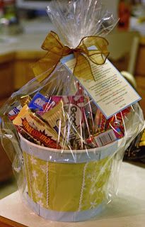 a basket filled with lots of candy sitting on top of a counter