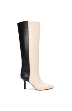 These gorgeous tall leather boots showcase a mesmerizing color block of Ecru and Black tones. Whether paired with slim-fit jeans for a refined office look or a flowing maxi skirt for an evening out, these are sure to make a statement in your shoe collection. DETAILS: 3.1" Heel Stiletto 15.7" shaft height Calf leather Pointy toe Inside Zipper Style #: 754161 Black Tones, Tall Leather Boots, Office Look, Leather Boot, Slim Fit Jeans, Shoe Collection, Fit Jeans, Calf Leather, Leather Boots