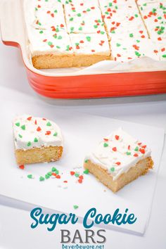 sugar cookie bars with white frosting and sprinkles