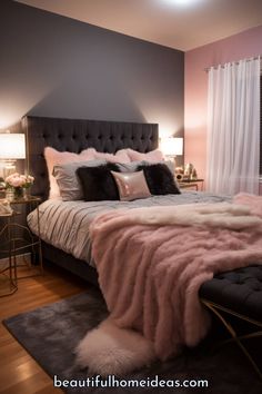 a large bed with pink fur on top of it in a bedroom next to a window