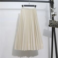 Grab this simple yet elegant Retro Slim Pleated Mid-Length Skirt For Women and expand your collection of skirts in your closet. The solid-colored skirts are available in several different colors which opens various options to buy from. The high-quality chiffon makes this skirt very light and comfortable. Non-stretch Full Maxi Skirt, Non-stretch Lined Maxi Skirt, Solid Non-stretch Lined Maxi Skirt, Spring Solid Color A-line Maxi Skirt, Elegant Non-stretch Pleated Flared Skirt, Elegant Non-stretch Flared Pleated Skirt, Solid Long Pencil Skirt For Fall, Elegant Full Pleated Skirt In Solid Color, Stretch Flared Maxi Skirt In Solid Color