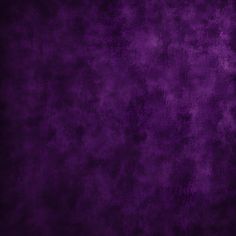 a dark purple background with some stains on it