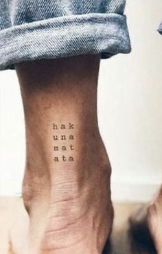 a person with a small tattoo on their foot