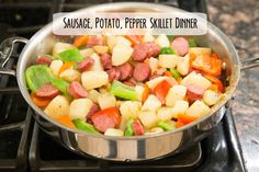 a pan filled with food sitting on top of a stove next to a burner