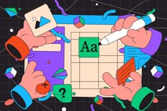 two hands are writing on a piece of paper with the word aa in it, surrounded by confetti and other objects