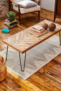 a coffee table sitting on top of a wooden floor