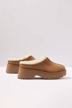 The UGG® New Heights Cozy Clog is crafted in a suede fabric with an EVA outsole and cozy UGGplush™ lining, a moisture-wicking textile made from a wool-rich blend but made to feel and wear like shearling. | UGG Women's New Hights Cozy Clog, Size 10, Brown Brown Clogs, Suede Fabric, Clogs Shoes, Womens Uggs, Chestnut, Moisture Wicking, Clogs, Autumn Fashion, Lookbook