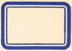 a blue and white square on top of a piece of paper