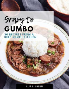 a white plate topped with meat and rice next to a bowl of gravy