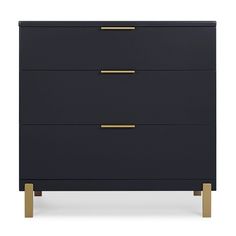 a black and gold dresser with three drawers