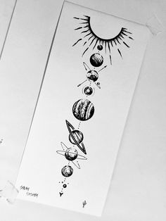 the solar system is drawn in black ink on white paper, and it's surrounded by other planets