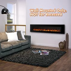 a living room with a couch, chair and fire place on the wall that reads wall mounted only not for recessed