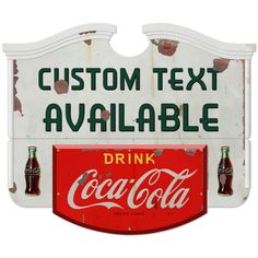 an old coca - cola sign with the words custom text available, and two coke bottles