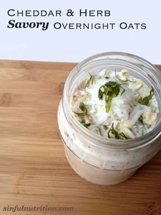 a jar filled with food sitting on top of a wooden table