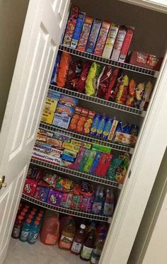 the pantry is stocked with many different types of food