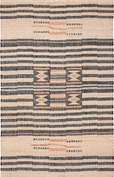 an old navajo rug with black and white stripes