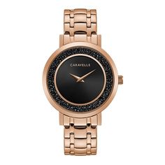 This Caravelle by Bulova women's watch features jet black rock crystals surrounding a minimalist black sunray inner dial. Rose gold-tone accents on dial and crown complement the rose gold-tone stainless steel case and five-link bracelet. This Caravelle by Bulova women's watch features jet black rock crystals surrounding a minimalist black sunray inner dial. Rose gold-tone accents on dial and crown complement the rose gold-tone stainless steel case and five-link bracelet. Click on this JEWELRY & Trendy Watches Women Fashion, Crystal Watches, Black Rock, Watch Model, Women's Watch, Rock Crystal, Stainless Steel Watch, Black Crystals, The Rose