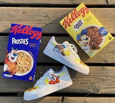 three cereal boxes and two sneakers on a bench