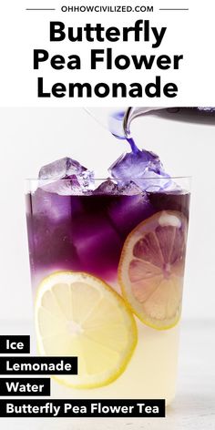 a glass filled with lemonade and ice on top of a table