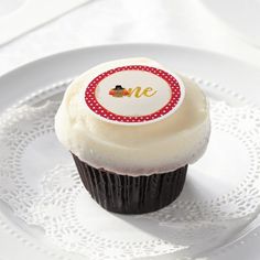 a cupcake sitting on top of a white plate