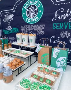 starbucks coffee themed dessert table with cookies and drinks