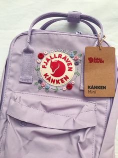 Custom embroidered Fjallraven Kanken with name. Perfect as a gift or as a school, daily, or travel bag! #gifts #kanken #backpack #school #cute #floral #embroidery #handmade #fjallraven Fljaraven Kanken, Kanken Mini Aesthetic, Kanken Backpack Aesthetic, Pink Kanken, Backpacks Aesthetic, Embroidered Kanken, Kanken Bag, Embroidery Aesthetic, Mochila Fjallraven Kanken