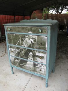 an old dresser has been painted with photos of people on it and is in the process of being repurposed