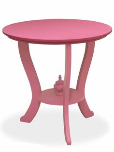 a pink table with a teapot on it's top and two legs in the middle