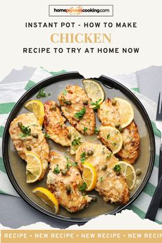 chicken with lemons and parsley on a plate, next to a fork and knife