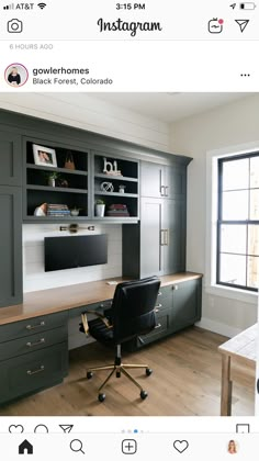 an instagram photo of a home office with built - in desk and bookcases