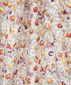 an image of a curtain with apples on the outside and leaves on the inside in red, yellow and white colors