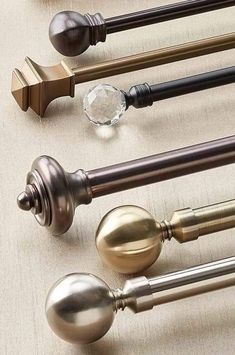 an assortment of metal handles and knobs