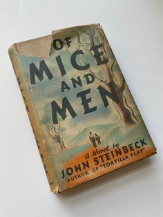 an old book with the title of mice and men