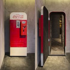 an old fashioned coca cola machine in the corner of a room next to a doorway