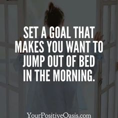 a woman standing in front of an open door with the words set a goal that makes you want to jump out of bed in the morning