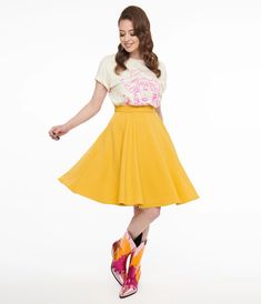 1950s Mustard Swing Skirt – Unique Vintage Fitted Yellow Skirt For Fall, Fitted 1950s Style Summer Skirt, Fitted Skirt In 1950s Style For Summer, Fitted Yellow Gathered Skirt, Yellow Stretch Skirt For Fall, Stretch Yellow Skirt For Fall, Yellow Stretch Flared Skirt, Yellow Retro Skirt With Relaxed Fit, Retro Fitted Full Skirt