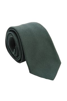 Embrace classic elegance with this forest green grenadine tie that will give your look understated sophistication and will make a lasting impression. Standard Length: Approx. 3.25" x 58.5". A classic tie width and length that is perfect for most men up to 6'2". 100% silk grenadine garza fina: Garza fina (fine gauze) is a loose weave fabric made from high-twist yarns. It has a slightly knobby texture. Tipped with our signature pinstripe silk: Not only is it a refined finishing touch, it keeps you Classic Green Ties For Formal Occasions, Classic Green Formal Tie, Green Dapper Ties For Business, Dapper Green Ties For Business, Elegant Green Ties For Workwear, Elegant Green Ties For Work, Elegant Green Tie For Work, Classic Green Suit And Tie Accessories For Semi-formal, Classic Green Suit And Tie Accessories For Semi-formal Occasions